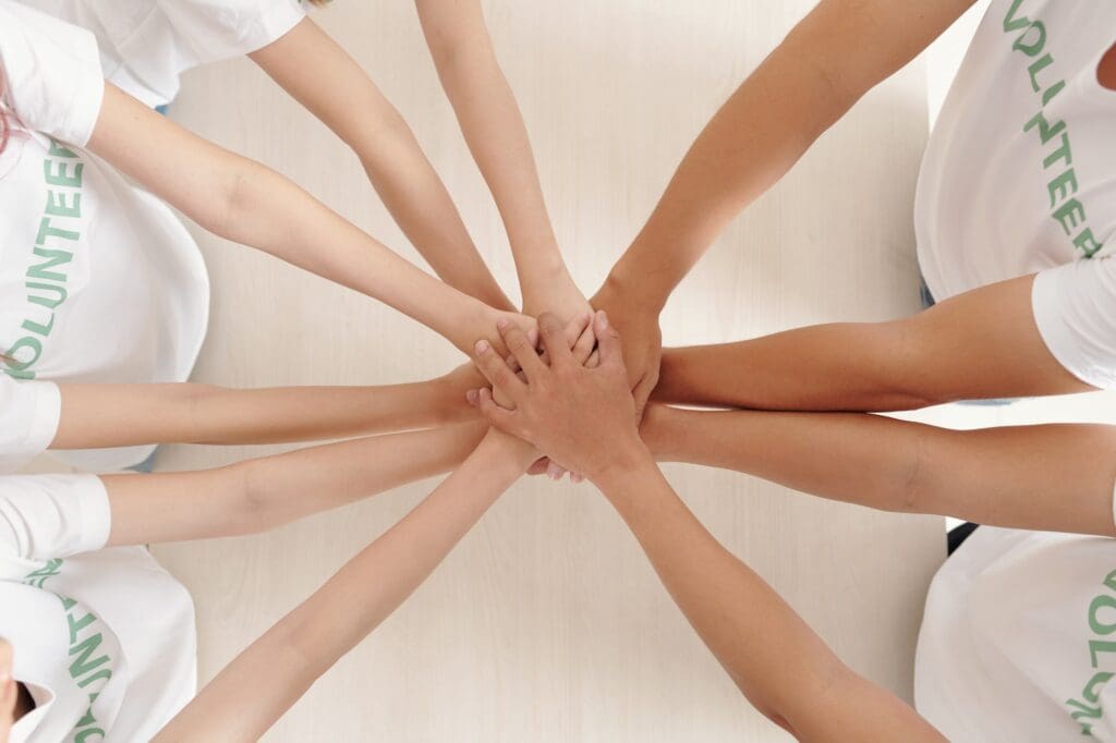Volunteers Stacking Hands