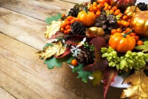 Fall or Thanksgiving holiday arrangement with pumpkins and autum